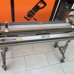 極東産機/自動壁紙糊付け機